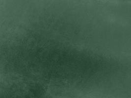 Olive green color velvet fabric texture used as background. light Olive green fabric background of soft and smooth textile material. There is space for text. photo
