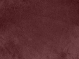 Winter Berry color dark red velvet fabric texture used as background. red fabric background of soft and smooth textile material. There is space for text. photo