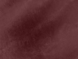 Winter Berry color dark red velvet fabric texture used as background. red fabric background of soft and smooth textile material. There is space for text. photo