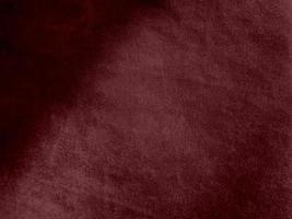 Winter Berry color dark red velvet fabric texture used as background. red fabric background of soft and smooth textile material. There is space for text. photo
