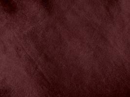 Winter Berry color dark red velvet fabric texture used as background. red fabric background of soft and smooth textile material. There is space for text. photo