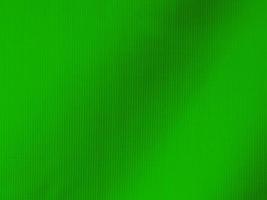 Light green velvet fabric texture used as background. Tone color green cloth background of soft and smooth textile material. There is space for text and for all types of design work.. photo