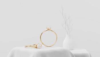 Gold Couple Diamond Rings 3D Rendering Placed on Cloth with Decoration photo