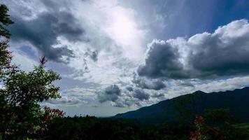 Moving clouds over mountain time lapse video