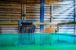 Japanese Hot Springs Onsen Natural Bath,  In the natural healing bamboo room, soft focus. photo