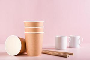 Choice between disposable paper cups and ceramic cups. Zero waste, environmental protection. photo