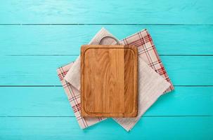 wooden table top view, desk for pizza with coloured napkins. Holiday, food concept photo