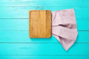 wooden table top view, desk for pizza with coloured napkins. Holiday, food concept photo