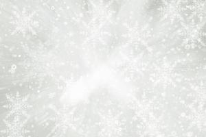 gray abstract background. white light and snowflakes Christmas blurred beautiful shiny lights use wallpaper backdrop and your product. photo