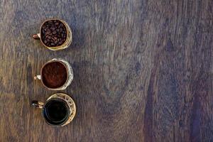 Coffee cup, beans and ground photo