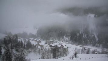 Foggy winter landscape in the mountains near Grossarl village, Austria, Europe video