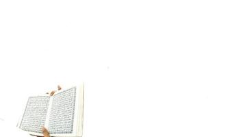 Man Holding and reading quran. Islamic Background photo