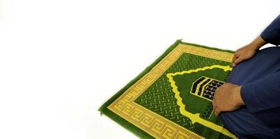 Man Holding and reading quran. Islamic Background photo