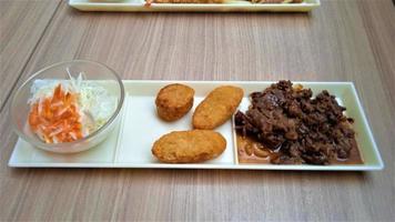 Japanese food on a wooden table, in a Japanese restaurant photo