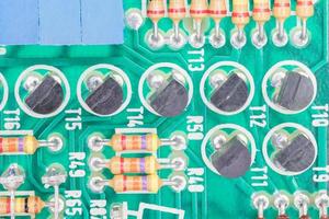 Condensers and Resistor assembly on the circuit board photo