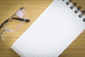 Notepad with blank page photo