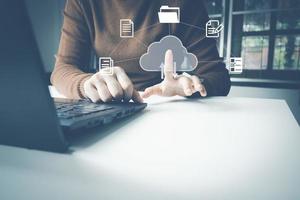 Officer using laptop manage files, Document Management System DMS, Online document database management, automated processes to manage system, ERP enterprise efficient, business technology. photo