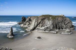 Elephant like rock on the beach photo