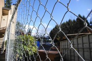 Wire pattern on a fence photo