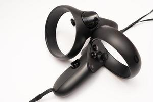 Samutprakarn Thailand Jan 23 2023 oculus rift touch controller isolated on white background. virtual reality wireless system created by Oculus VR division of Facebook. photo