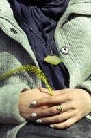 Close up female nature lover hands holding green fern leaf concept photo