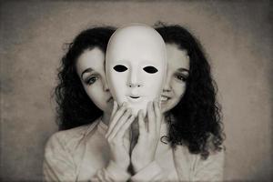 two-faced woman manic depression concept photo