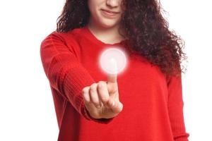 girl pushing virtual button on touch screen photo