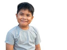 Portrait of smiling boy isolated on white background photo