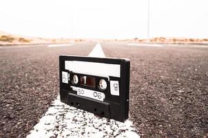 Cassette tape on the road photo