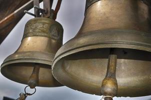 two bronze bells photo
