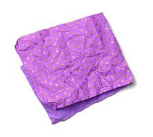 piece of folded crumpled purple paper for wrapping a gift isolated on white background photo