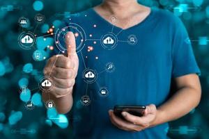 person scan thumbs to access secure data. new technology bigdata and business process strategy,customer service management.Digital transformation change management,internet of things.cloud computing. photo