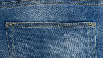 back pocket of blue jeans, full frame photo