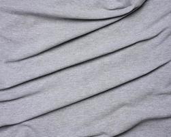 mottled gray cotton fabric for clothing, fabric creased photo