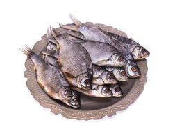 raw fish ram on an iron plate photo