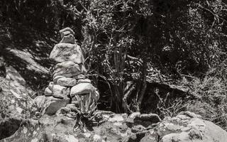 Stacked stones as a guide for hikers Table Mountain Nationalpark. photo