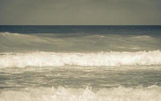 Fish Hoek Beach False Bay turquoise water waves Cape Town. photo