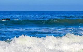 Extremely huge big surfer waves at beach Puerto Escondido Mexico. photo