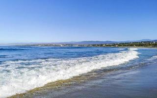 Extremely huge big surfer waves at beach Puerto Escondido Mexico. photo