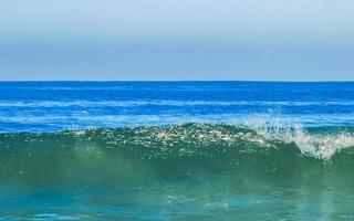 Extremely huge big surfer waves at beach Puerto Escondido Mexico. photo