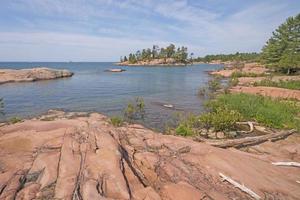 Worn Granite Rocks on a Wilderness Lakeshore photo