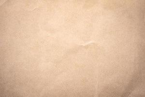 Close up crumpled brown paper texture and background with copy space photo