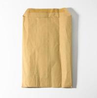 rectangular open brown kraft paper envelope on white background photo