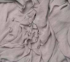 folded gray silk fabric, full frame photo