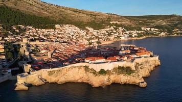 Aerial drone view of the Old historic city of Dubrovnik in Croatia, UNESCO World Heritage site. Famous tourist attraction in the Adriatic Sea. Fortified old city. Tourism and travel to Croatia. video