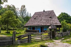 Old rural house in the summer season photo