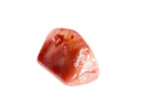 Macro mineral stone Carnelian on white background photo