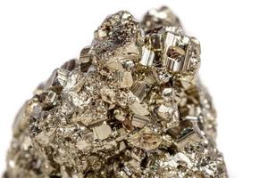 Macro mineral stone Pyrite gold on white background photo