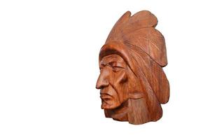 Wood head Indian on white background photo