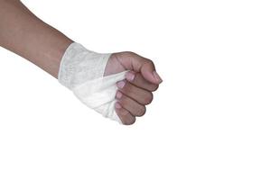 Gauze bandage  treating patient with hand with wrist left  isolated on white background, and clipping path photo